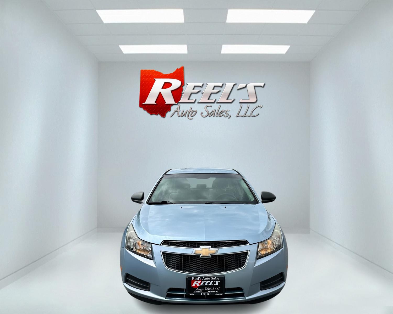 2011 Blue /Black Chevrolet Cruze LS Auto (1G1PC5SHXB7) with an 1.8L I4 DOHC 16V engine, 6-Speed Automatic transmission, located at 547 E. Main St., Orwell, OH, 44076, (440) 437-5893, 41.535435, -80.847855 - Photo #1